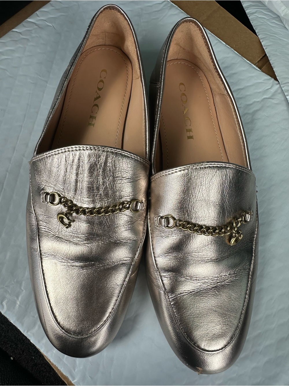 COACH Metallic Silver Loafers with Gold Chain Detail